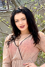 Ukrainian mail order bride Vladlena from Chuguev with black hair and blue eye color - image 3