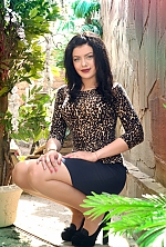 Ukrainian mail order bride Vladlena from Chuguev with black hair and blue eye color - image 7