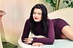 Ukrainian mail order bride Vladlena from Chuguev with black hair and blue eye color - image 2