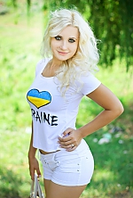 Ukrainian mail order bride Anna from Kropyvnytskyi with blonde hair and grey eye color - image 5