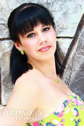 Ukrainian mail order bride Anastasia from Nikolaev with black hair and blue eye color - image 1