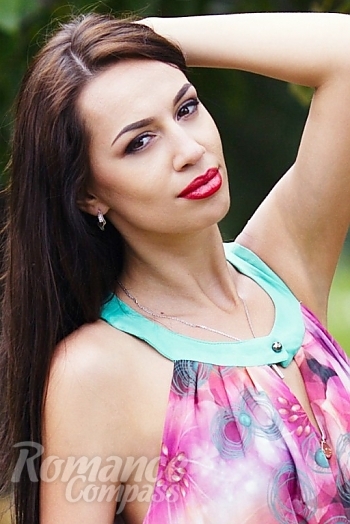 Ukrainian mail order bride Alina from Rubignoe with black hair and green eye color - image 1