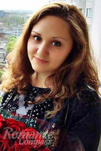 Ukrainian mail order bride Elena from Odessa with light brown hair and green eye color - image 1