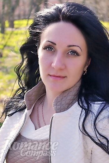 Ukrainian mail order bride Olga from Kherson with black hair and blue eye color - image 1