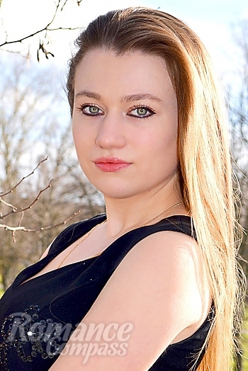 Ukrainian mail order bride Anastasia from Kherson with light brown hair and grey eye color - image 1
