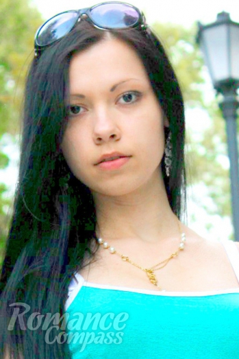 Ukrainian mail order bride Anna from Kiev with black hair and black eye color - image 1