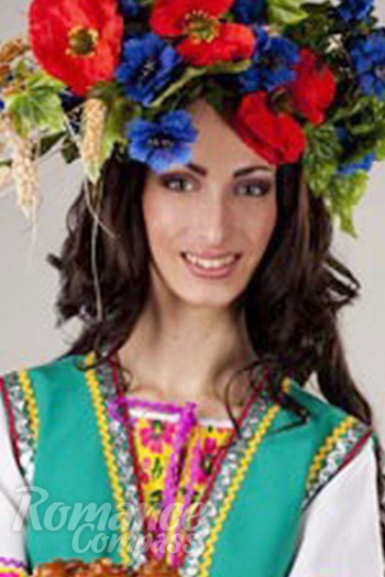Ukrainian mail order bride Antonina from Zaporozhye with black hair and green eye color - image 1