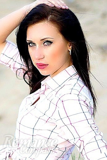 Ukrainian mail order bride Nataliya from Lugansk with black hair and green eye color - image 1
