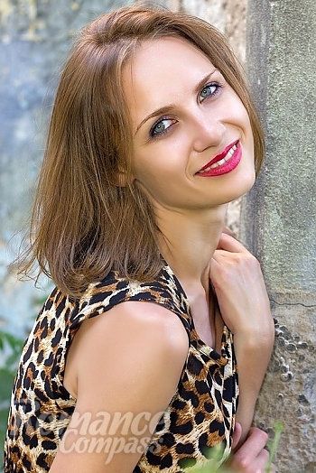 Ukrainian mail order bride Viktoriya from Nikolaev with light brown hair and blue eye color - image 1