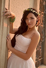 Ukrainian mail order bride Aksa from Nikolaev with brunette hair and green eye color - image 2