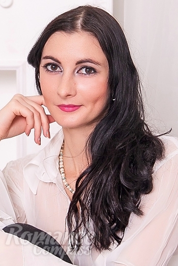 Ukrainian mail order bride Olga from Nikolayev with black hair and hazel eye color - image 1