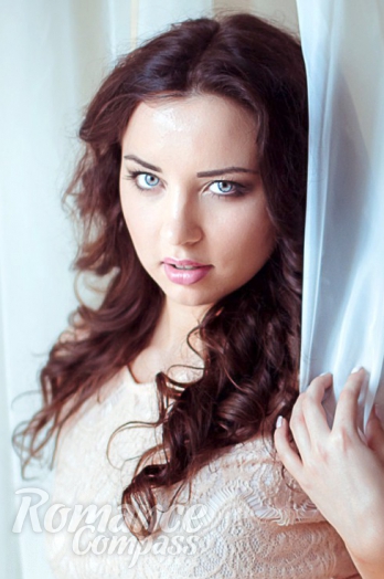 Ukrainian mail order bride Veronika from Dnipro with light brown hair and blue eye color - image 1