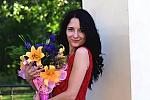 Ukrainian mail order bride Dana from Zaporozhye with black hair and green eye color - image 3