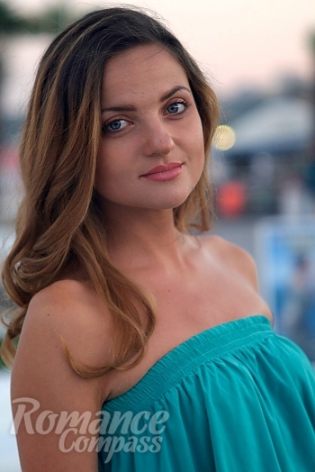 Ukrainian mail order bride Natalia from Odessa with light brown hair and blue eye color - image 1