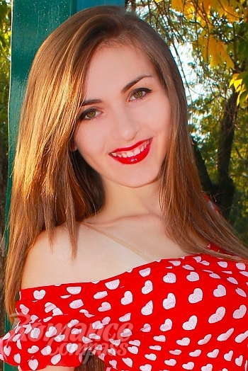 Ukrainian mail order bride Olga from Nikolaev with light brown hair and green eye color - image 1