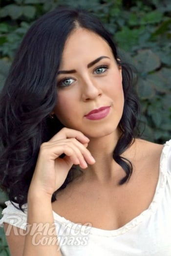 Ukrainian mail order bride Anastasiya from Zaporozhye with black hair and green eye color - image 1