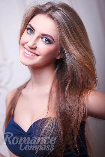Ukrainian mail order bride Maria from Dnipro with light brown hair and green eye color - image 1