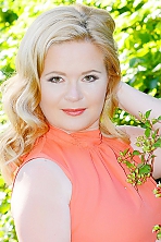 Ukrainian girl Natalia,45 years old with green eyes and blonde hair.