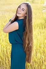 Ukrainian mail order bride Natalia from Kharkiv with brunette hair and blue eye color - image 3