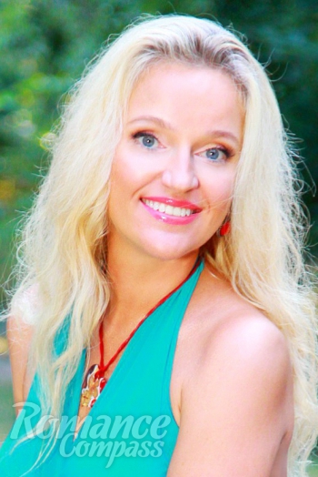Ukrainian mail order bride Larisa from Kiev with blonde hair and grey eye color - image 1