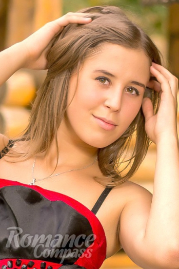 Ukrainian mail order bride Katerina from Nikolaev with light brown hair and brown eye color - image 1