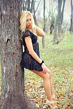 Ukrainian mail order bride Lyudmila from Priluki with light brown hair and blue eye color - image 7