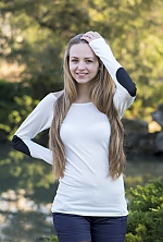 Ukrainian mail order bride Adelina from Kherson with blonde hair and green eye color - image 8