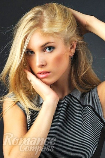 Ukrainian mail order bride Darina from Kharkov with blonde hair and blue eye color - image 1