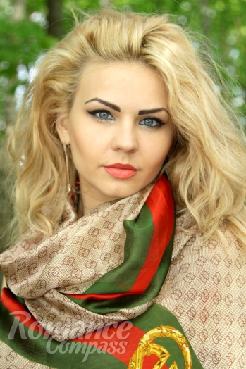 Ukrainian mail order bride Svetlana from Sumy with blonde hair and blue eye color - image 1