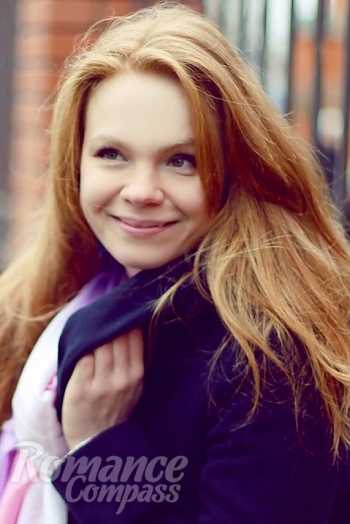 Ukrainian mail order bride Nataliya from Chornomorsk with red hair and brown eye color - image 1