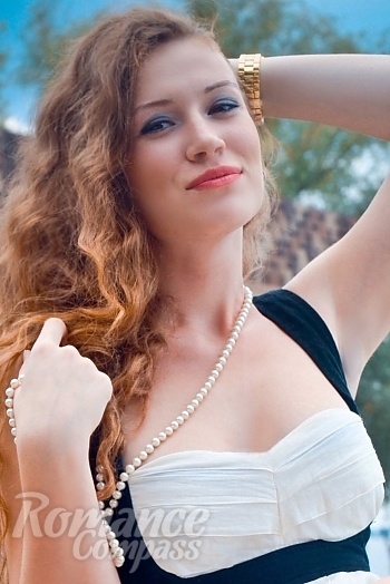 Ukrainian mail order bride Anastasiya from Zolotonosha with red hair and hazel eye color - image 1