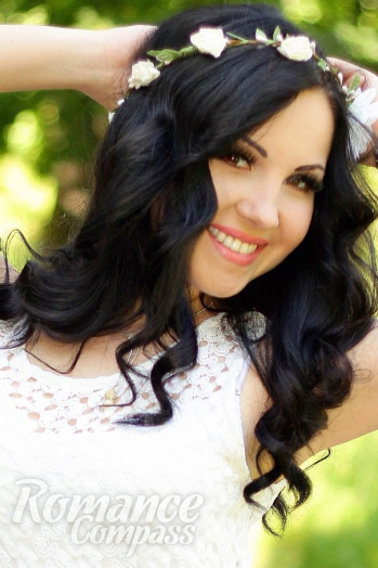 Ukrainian mail order bride Victoria from Sumy with black hair and brown eye color - image 1