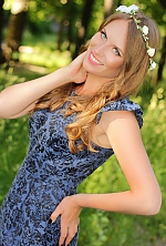 Ukrainian mail order bride Daria from Sumy with light brown hair and blue eye color - image 2