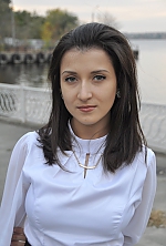 Ukrainian mail order bride Oksana from Nikolaev with brunette hair and green eye color - image 2