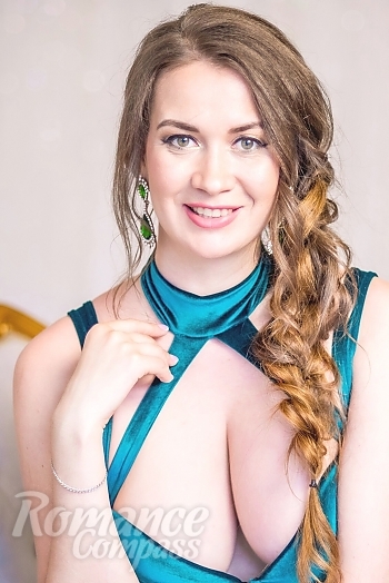 Ukrainian mail order bride Marina from Kiev with light brown hair and green eye color - image 1