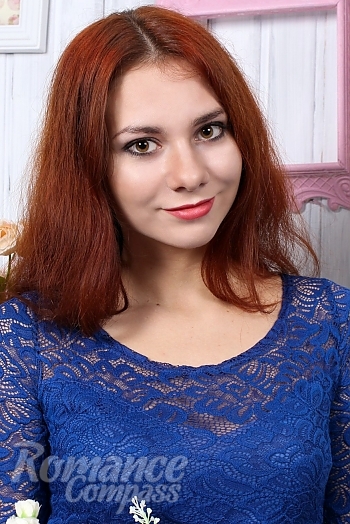 Ukrainian mail order bride Yulia from Nikolaev with red hair and green eye color - image 1