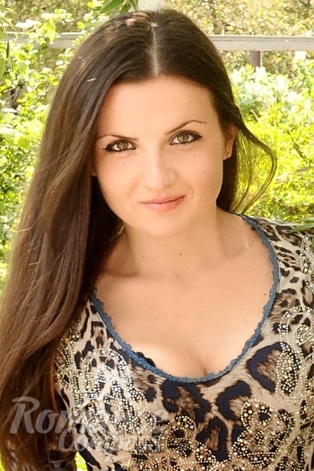 Ukrainian mail order bride Anna from Kharkov with light brown hair and green eye color - image 1