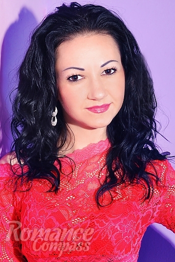 Ukrainian mail order bride Yana from Chuhuiv with black hair and hazel eye color - image 1