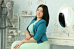 Ukrainian mail order bride Daria from Kyiv with black hair and green eye color - image 3