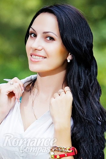 Ukrainian mail order bride Oksana from Odessa with brunette hair and hazel eye color - image 1