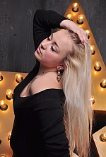 Ukrainian mail order bride Anastasia from Lugansk with blonde hair and grey eye color - image 4