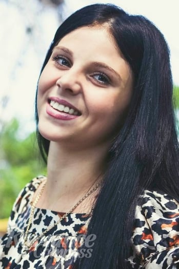 Ukrainian mail order bride Anastasia from Alchevsk with black hair and green eye color - image 1