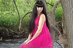 Ukrainian mail order bride Anastasia from Alchevsk with black hair and green eye color - image 5