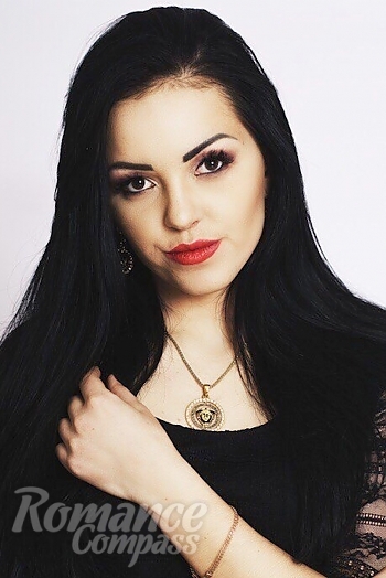 Ukrainian mail order bride Kate from Kiev with black hair and hazel eye color - image 1