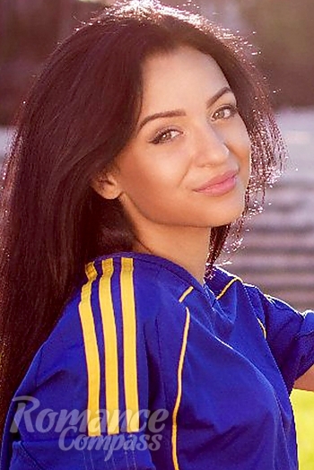 Ukrainian mail order bride Anastasia from Kharkov with black hair and brown eye color - image 1