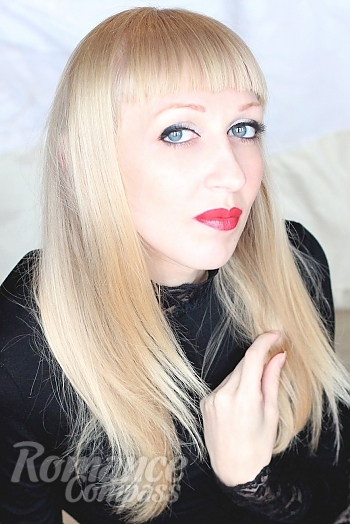 Ukrainian mail order bride Anna from Lugansk with blonde hair and grey eye color - image 1
