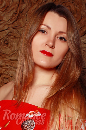 Ukrainian girl Olga,38 years old with hazel eyes and light brown hair.