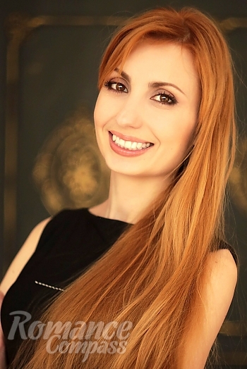Ukrainian mail order bride Tatiana from Nikolaev with red hair and brown eye color - image 1