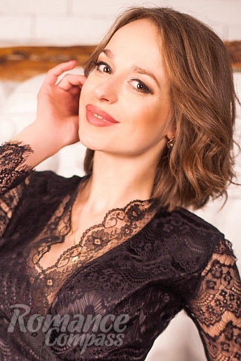 Ukrainian mail order bride Yana from Odessa with light brown hair and brown eye color - image 1
