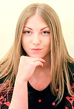 Ukrainian mail order bride Alina from Luhansk with light brown hair and blue eye color - image 2